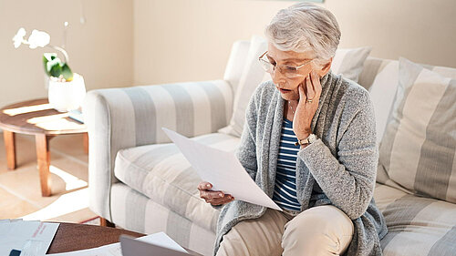 A picture of an older person looking concerned.