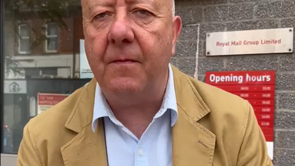 Steve outside a post office 