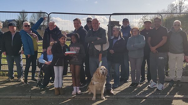 An image of Steve Darling MP with residents outside the land at Darwin Crescent 